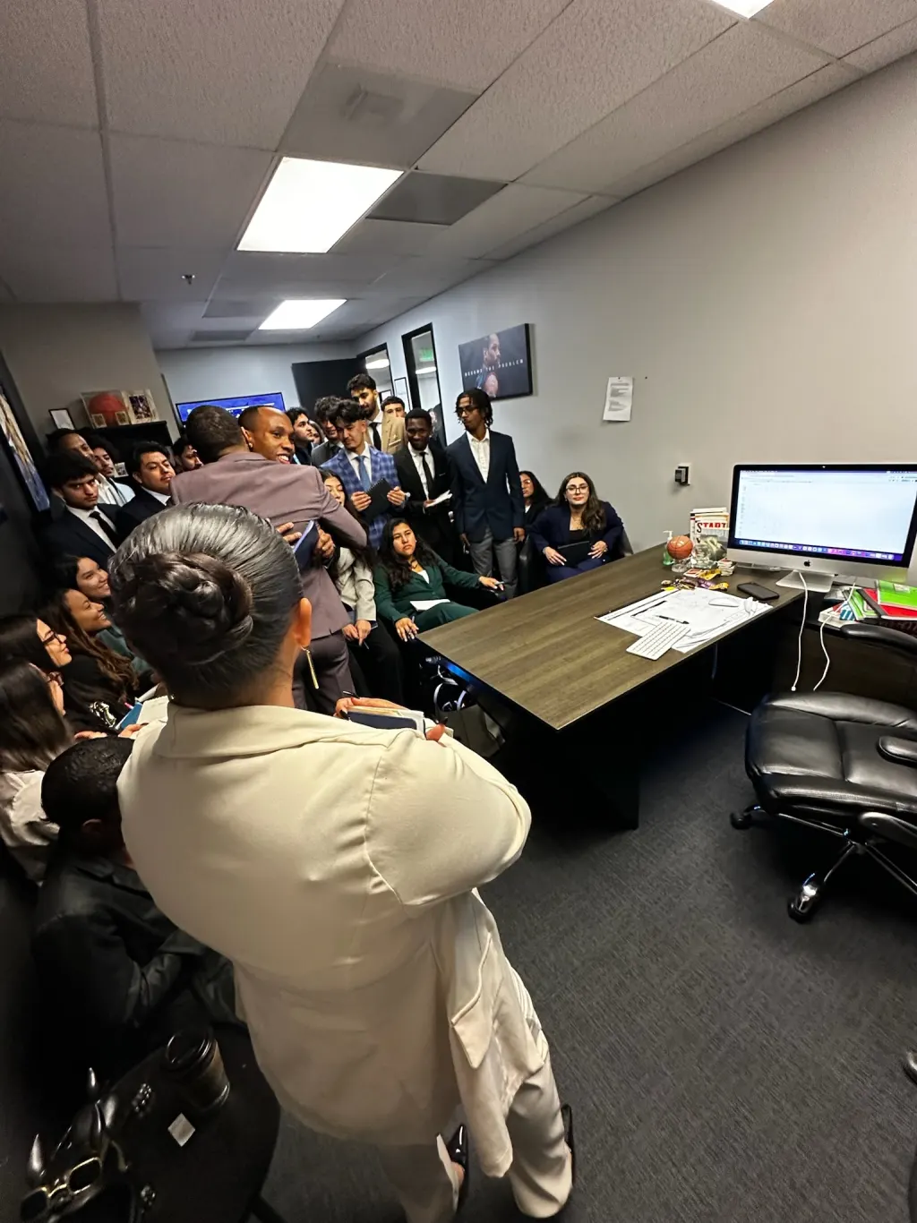 The White Whale Marketing team in a meeting at the Fairfax office